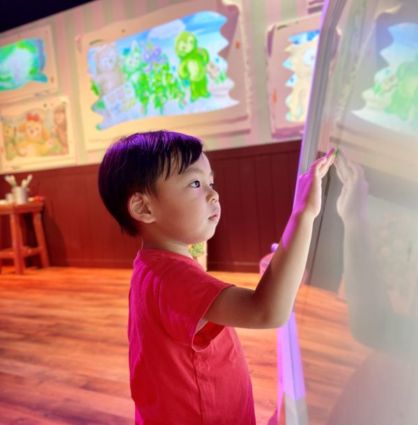 portrait-cute-boy-playing-electric-kiosk portrait-cute-boy-playing-electric-kiosk
